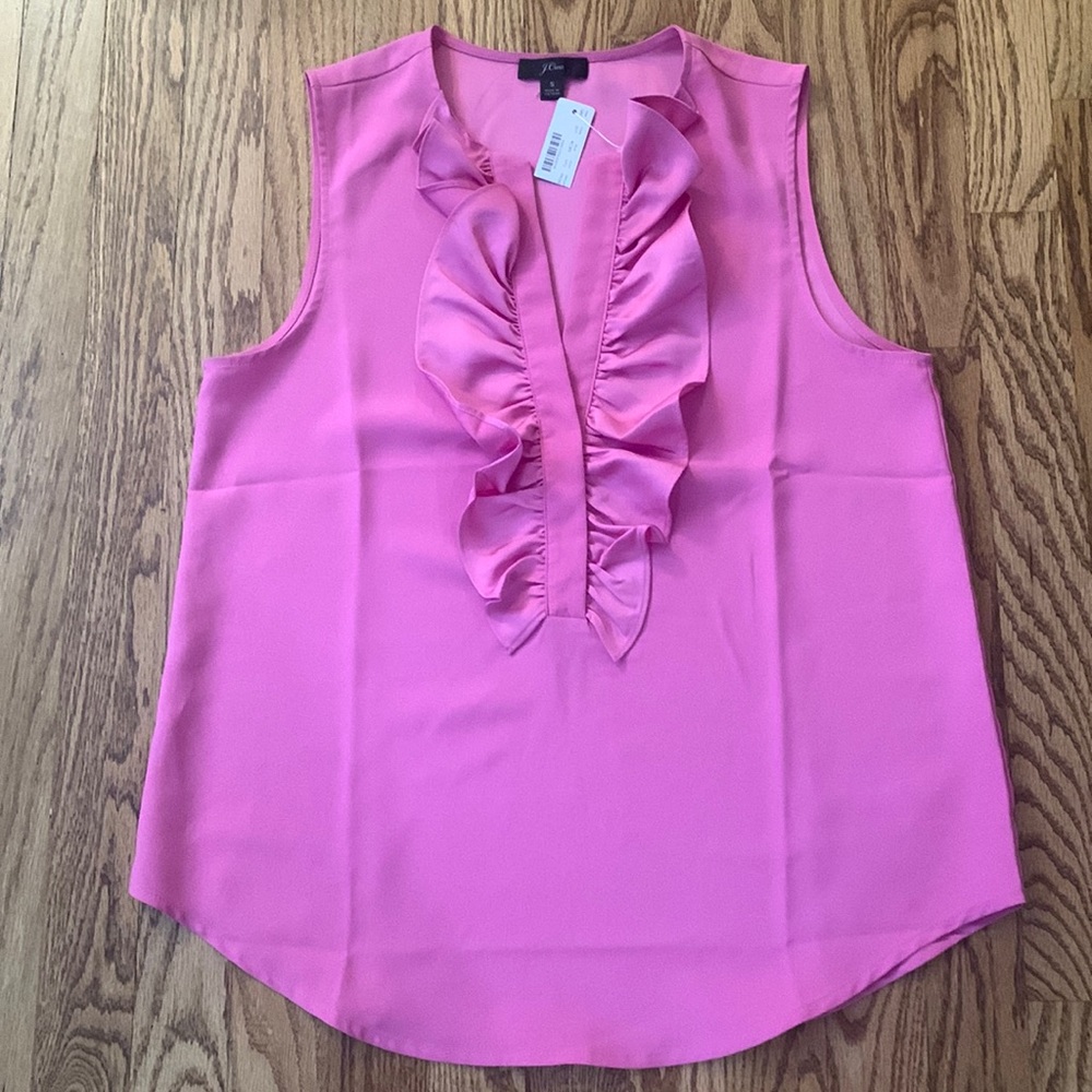 J.Crew small pink silk tank with ruffled detail.